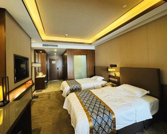 Shuishi Forest Hot Spring Resort - Qiqihar - Yatak Odası