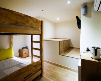 24 Guesthouse Seoul Station Premier - Seoul - Schlafzimmer