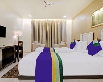 Treebo Premium Golden Bliss Trimurti Nagar Square - Nagpur - Bedroom