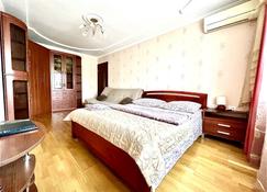 Na Sovetskoy ploschadi Apartments - Saransk - Bedroom