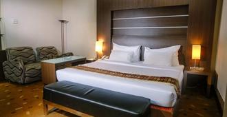 Furaya Hotel - Pekanbaru - Κρεβατοκάμαρα