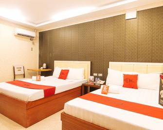 RedDoorz Plus at Winter Benitez - Manila - Bedroom