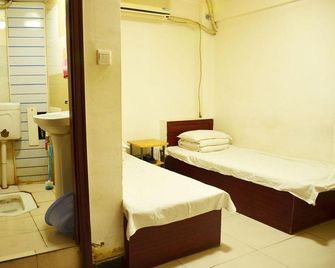Xindayang Hostel - Dalian - Habitación