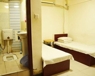 Xindayang Hostel - Dalian - Habitación