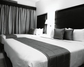 Hotel Rameswaram Grand - Rameswaram - Bedroom