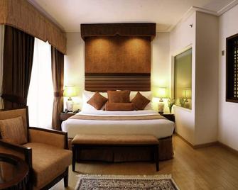 Park Lane Hotel Lahore - ลาฮอร์ - ห้องนอน
