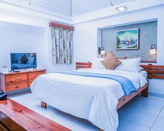 Visa Lodge - Puerto Príncipe