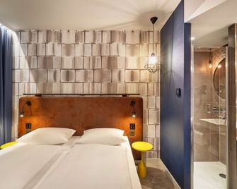 إتش هوتل ماينس - ماينز - غرفة نوم