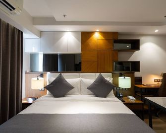 One Euphoria Luxe Hotel - Angeles City - Спальня