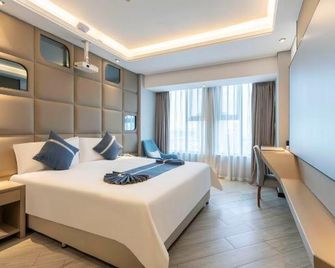 Polka Hotel - Mianyang - Camera da letto