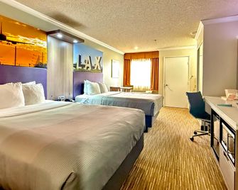 Quality Inn & Suites Los Angeles Airport - Stadium District - Inglewood - Schlafzimmer