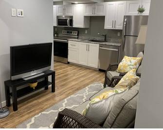 Fresh and newly renovated 2 bedroom bsmt suite. Fully furnished 2 min 2 hosptl - Prince George - Living room