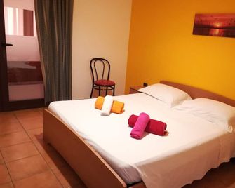 Camere Oasi - Porto Cesareo - Habitación