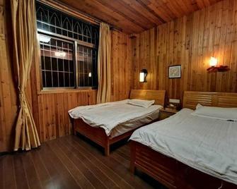 Weiqunlou Inn No. 1 - Zhangzhou - Bedroom