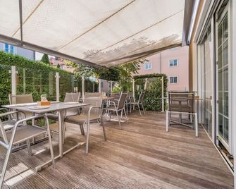 Villa Ceconi by Das Grüne Hotel zur Post - 100% BIO - Salisburgo - Patio