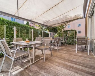 Villa Ceconi by Das Grüne Hotel zur Post - 100% BIO - זלצבורג - פטיו