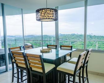 23o Penthouse Stunning Oceanview Resort Lifestyle - Playa Bonita Village - Dining room