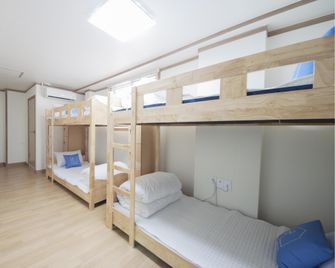 Dh Myeongdong Guesthouse - סיאול - חדר שינה