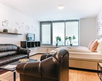 فلورا كوزي أبارتمنت باي تشورز - براتيسلافا - غرفة معيشة