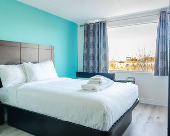 Howard Johnson by Wyndham Brampton - Brampton - Slaapkamer