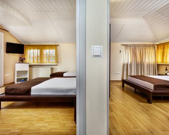 Amfion Hotel - Olympiaki Akti - Schlafzimmer
