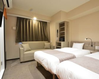 Hotel Sanrriott Shinsaibashi - Осака - Спальня