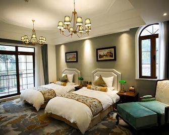 Pengxin Garden Guobin Hotel - Nantong - Bedroom