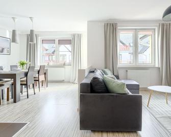 Apartamenty Sun & Snow Plac Neptuna - Międzyzdroje - Living room