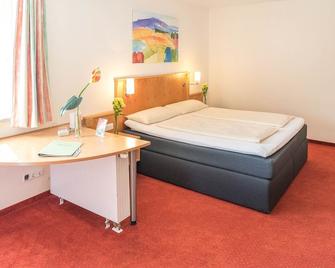 Hotel Pension Futterknecht - Burgau - Camera da letto