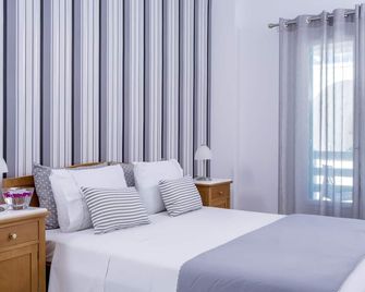 Santellini Hotel - Kamari - Sovrum