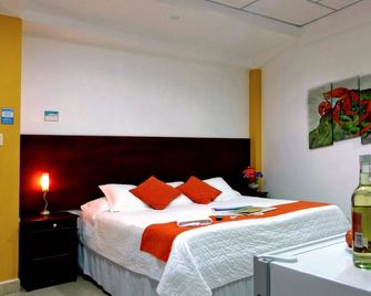 Hotel Brisas Del Pacifico - Puerto Ayora - Schlafzimmer