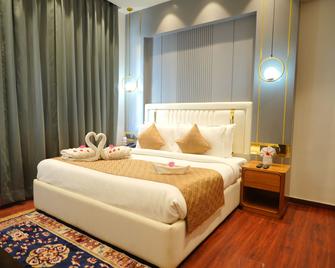 Comfort Inn Tarori Karnal - Karnal - Slaapkamer