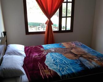 Hotel Rural Posada de los Santos - Ráquira - Bedroom
