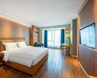 Qiyu Hotel (Xi'an Old Town Gen Gpark) - Xi'an - Habitación