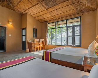 Jungle Villa Resort - Chitwan - Bedroom