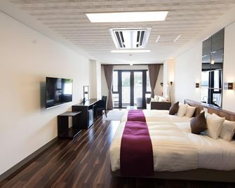 Livemax Resort Jogasaki Kaigan - Itō - Schlafzimmer