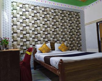 happy palace resort - Gaya - Slaapkamer