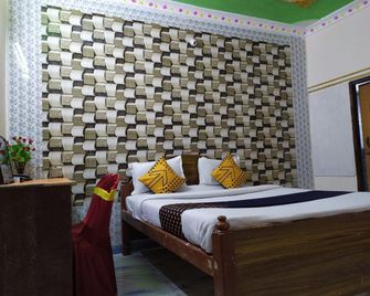 happy palace resort - Gaya - חדר שינה