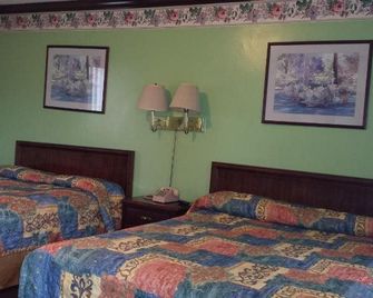 Executive Lodge - Alcoa - Slaapkamer