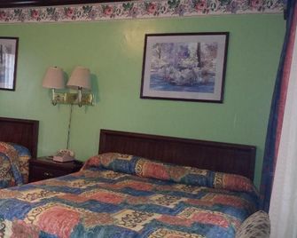 Executive Lodge - Alcoa - Quarto