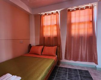 C & M Suites Your Haven in the City - Roseau - Bedroom