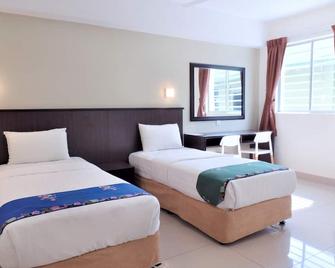 Sipadan Inn Service Apartments Semporna - Semporna - Camera da letto