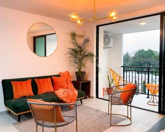 Apartamento Moderno Orange Place + Wifi+ Pool+ Gym - Santa Tecla - Sala de estar