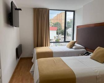 Hotel Dorado Ferial - Bogotá - Bedroom