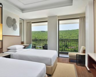 كورتيارد باي ماريوت ماهاباليشوار - ماهاباليشوار - غرفة نوم