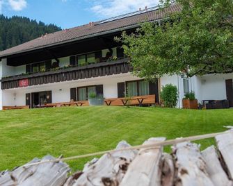 Vacation apartment Bergliebe - Guesthouse Sonnenplatzerl - Pfronten - Edificio