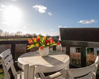 Apartment Dina with parking and shared pool by Interhome - De Haan - Balkon