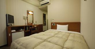 Hotel Route-Inn Saga Ekimae - Saga - Bedroom