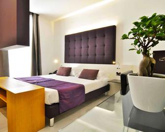 هوتل لا بوسولا - ميلاتسو - غرفة نوم