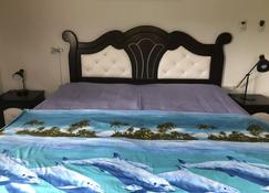 My Ozi Perl Creole Vila - Grand'Anse Praslin - Schlafzimmer